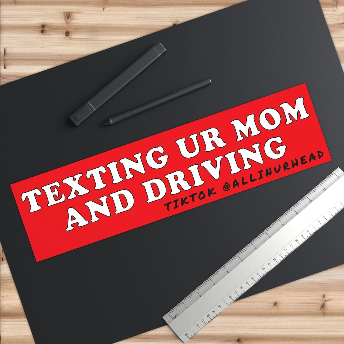 the 'label' - bumper sticker texting ur mom